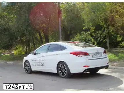 Фото автомобиля HYUNDAI I40, 2015 — госномер Т243УТ64. Цвет: Белый