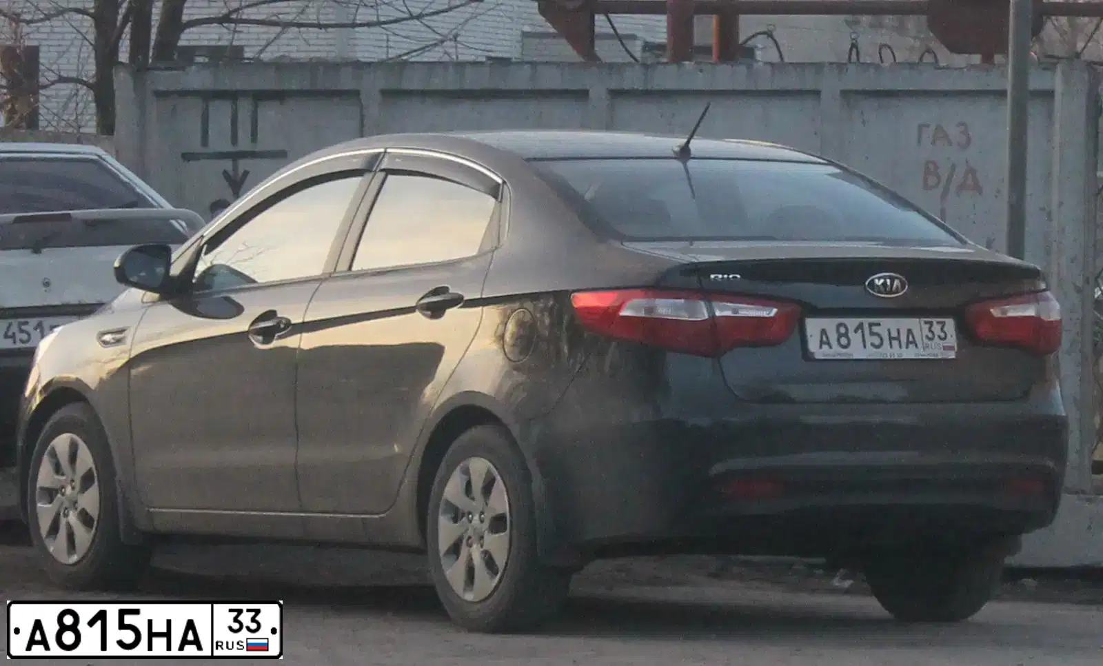 Фото автомобиля KIA RIO, 2012 — госномер А815НА33. Цвет: ЧЕРНЫЙ
