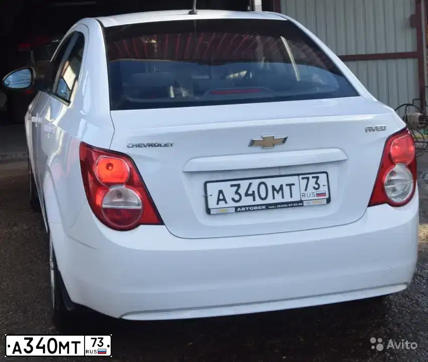 Фото автомобиля CHEVROLET AVEO, 2012 — госномер С154РА73. Цвет: Белый