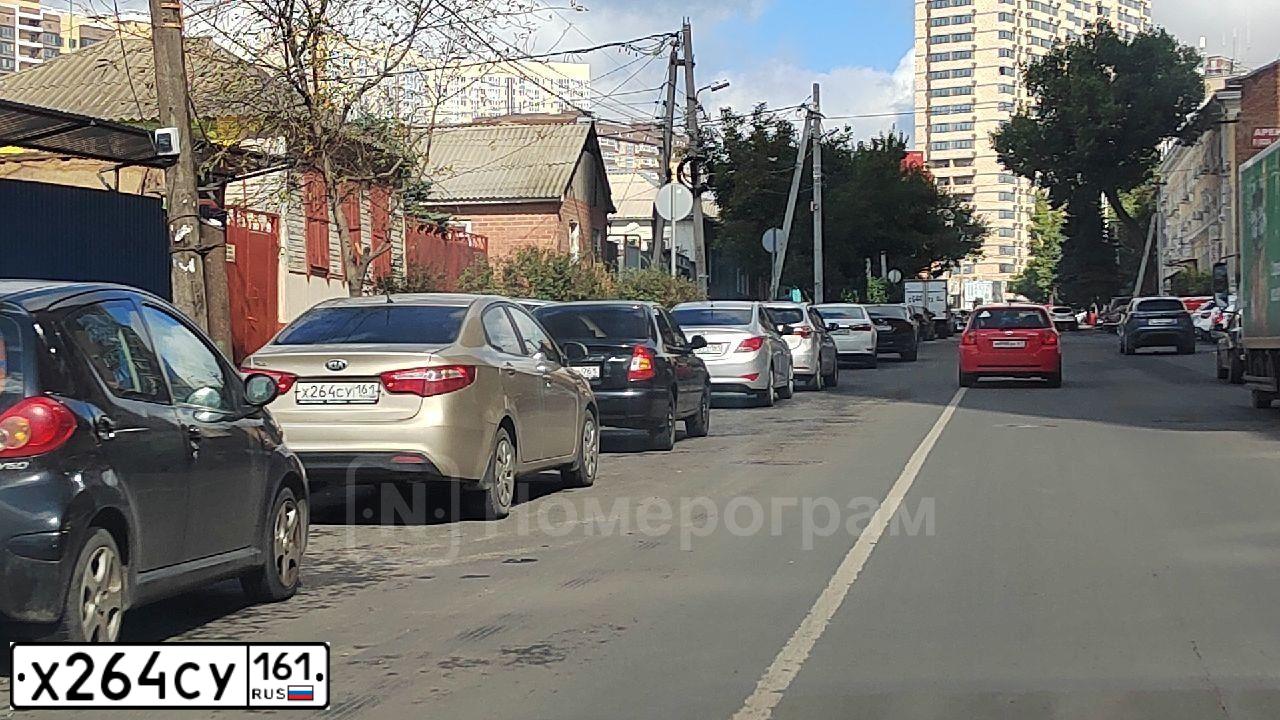 Фото автомобиля KIA RIO, 2014 — госномер Х264СУ161. Цвет: БЕЖЕВЫЙ