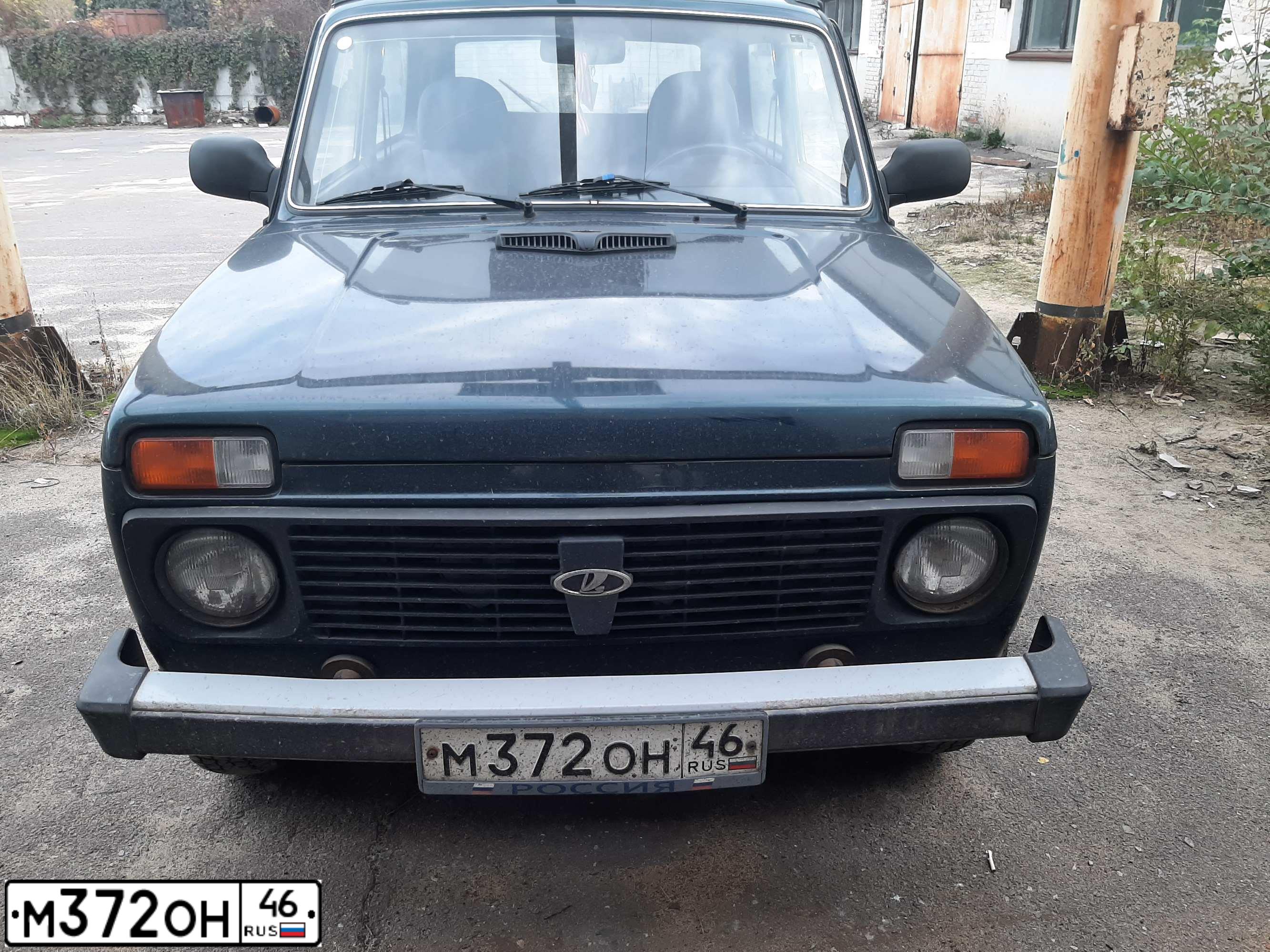 Фото автомобиля LADA 2121 NIVA, 2011 — госномер Р710АН46. Цвет: ТЕМНО-ЗЕЛЕНЫЙ
