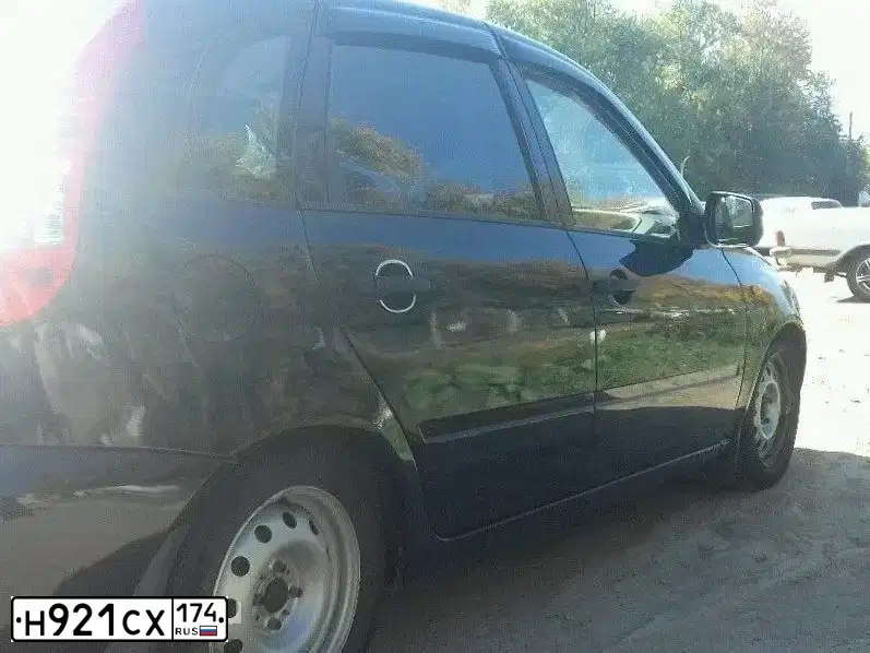 Фото автомобиля LADA KALINA, 2010 — госномер У871АР774. Цвет: ЧЕРНЫЙ