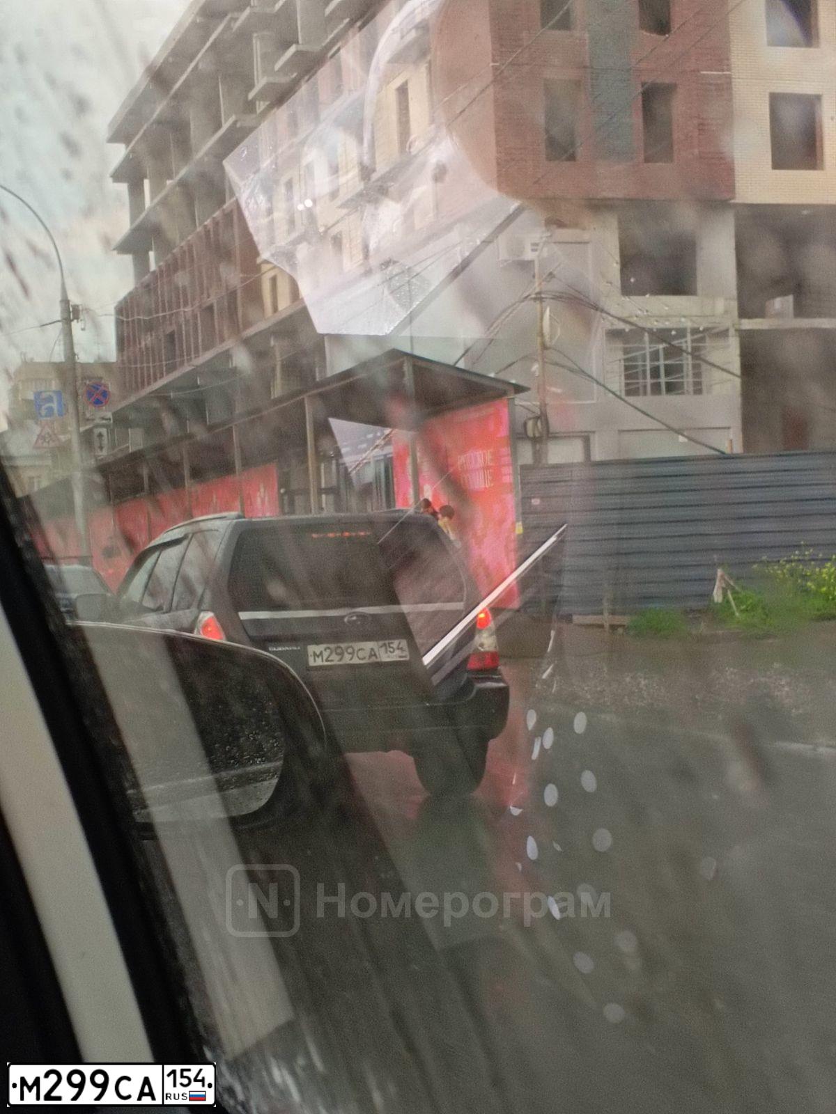 Фото автомобиля SUBARU FORESTER, 2007 — госномер М299СА154. Цвет: СЕРЫЙ