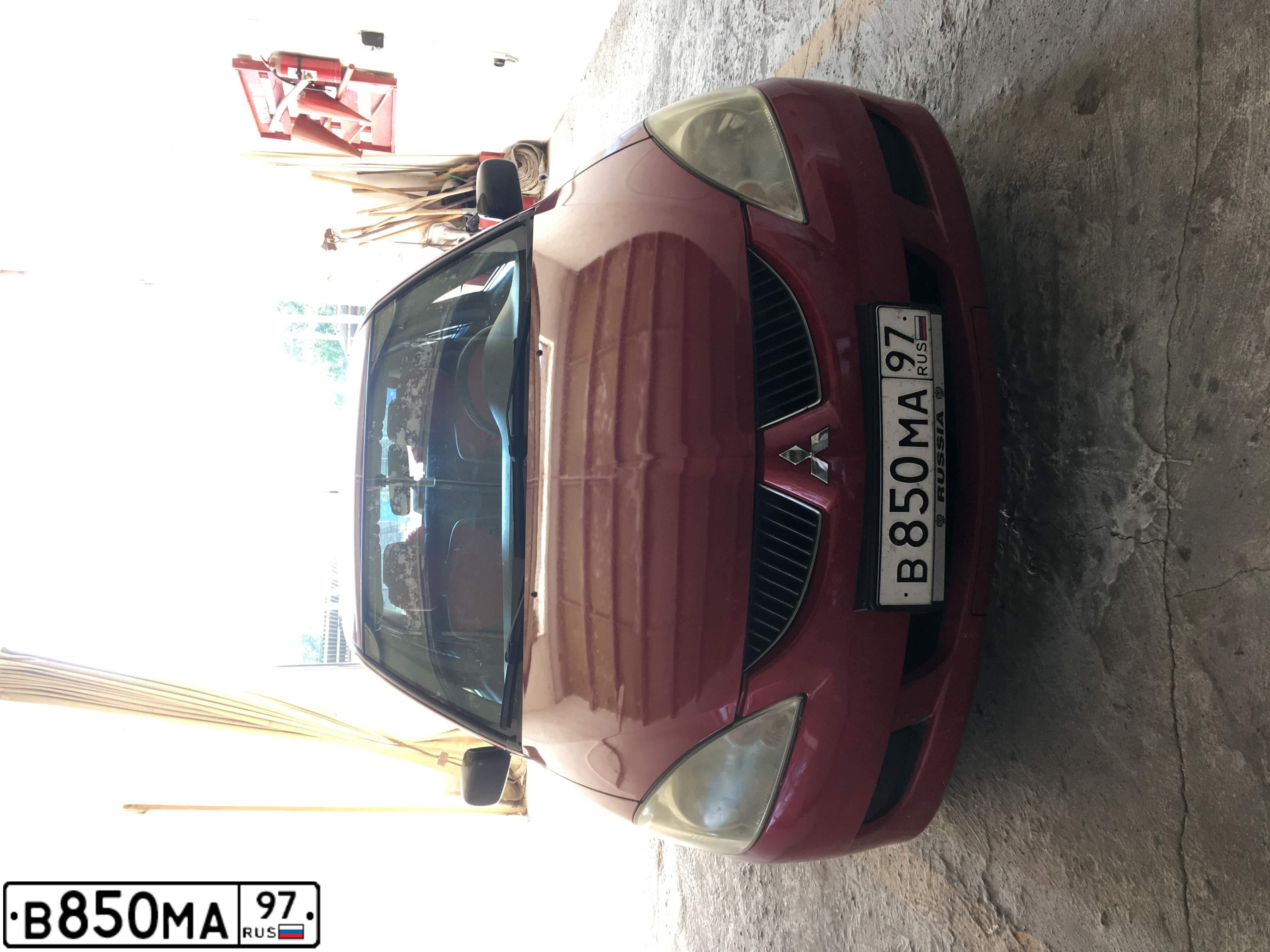 Фото автомобиля MITSUBISHI LANCER, 2003 — госномер К930ТЕ134