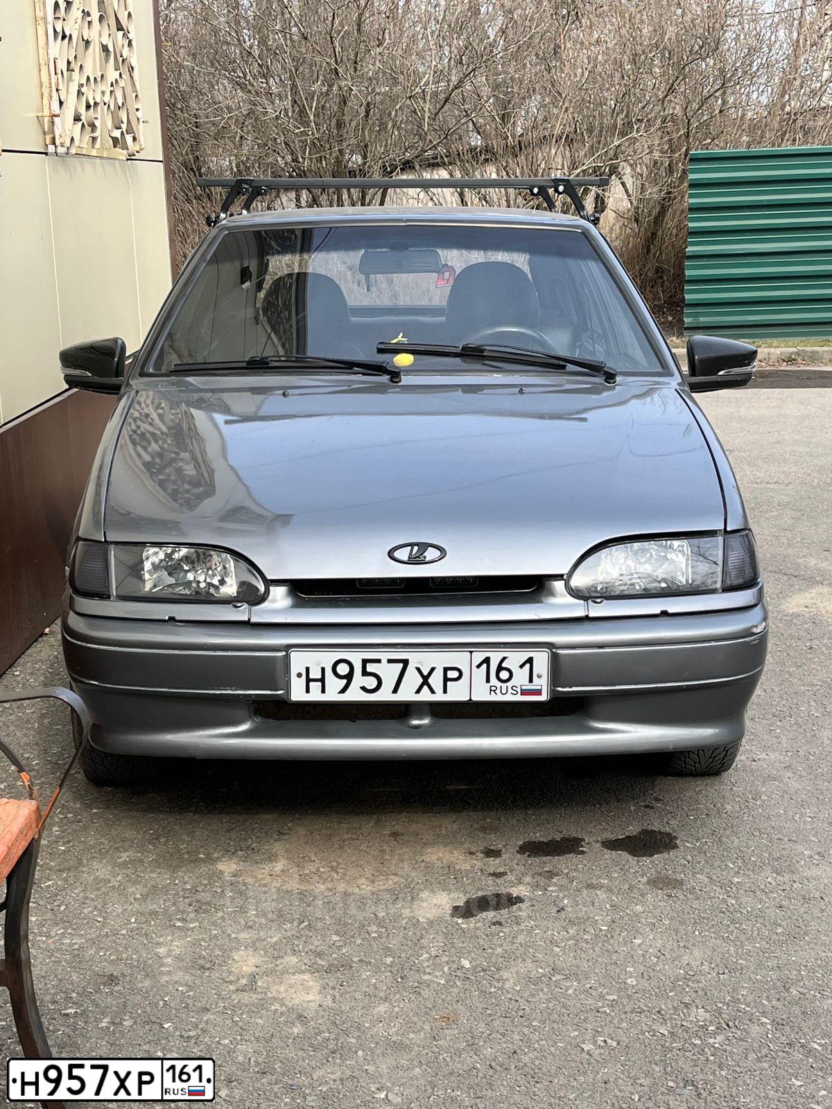 Фото автомобиля LADA 2114 SAMARA, 2007 — госномер Н957ХР161. Цвет: СРЕДНИЙ СЕРО-ЗЕЛЕНЫЙ МЕТ