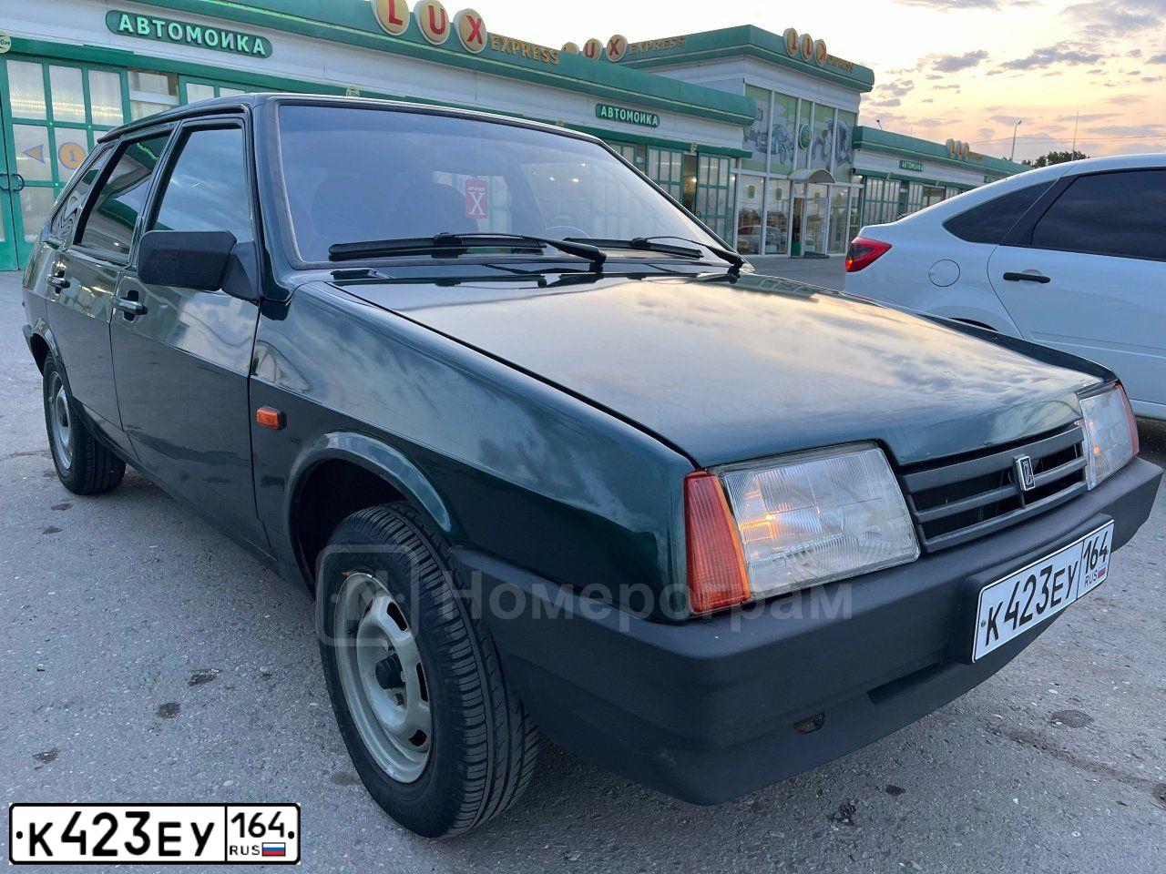 Фото автомобиля LADA 2109 SAMARA, 2003 — госномер К423ЕУ164. Цвет: ТЕМНО ЗЕЛЕНЫЙ