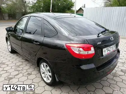 Фото автомобиля LADA 2191 GRANTA, 2014 — госномер У142ТВ56. Цвет: ЧЕРНЫЙ