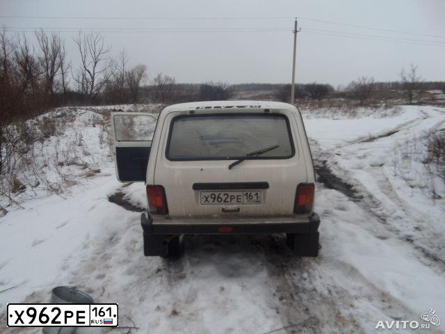 Фото автомобиля LADA 2121 NIVA, 1999 — госномер К989ЕЕ61. Цвет: ЯРКО БЕЛЫЙ