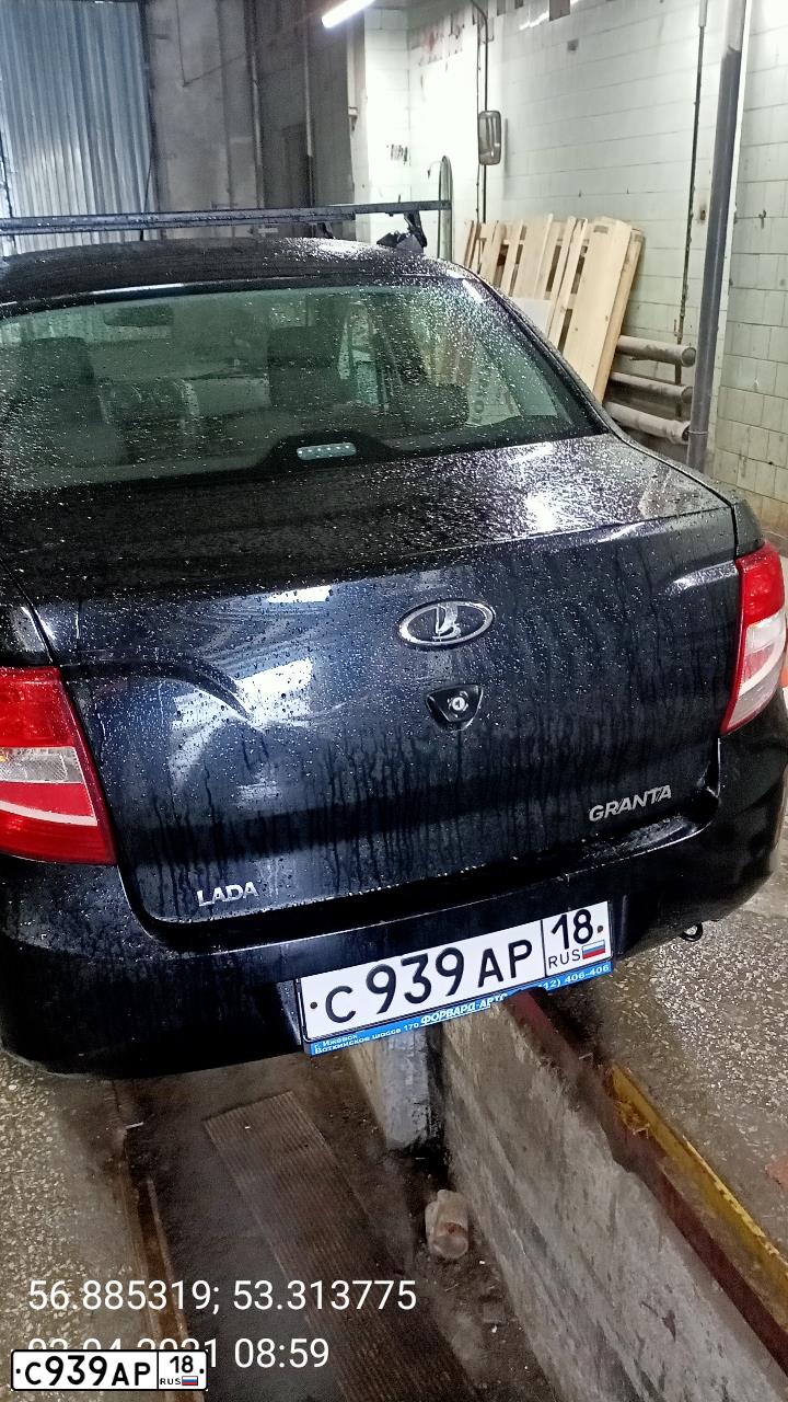 Фото автомобиля LADA 2190 GRANTA, 2013 — госномер К077ЕМ702. Цвет: Сине-Черный