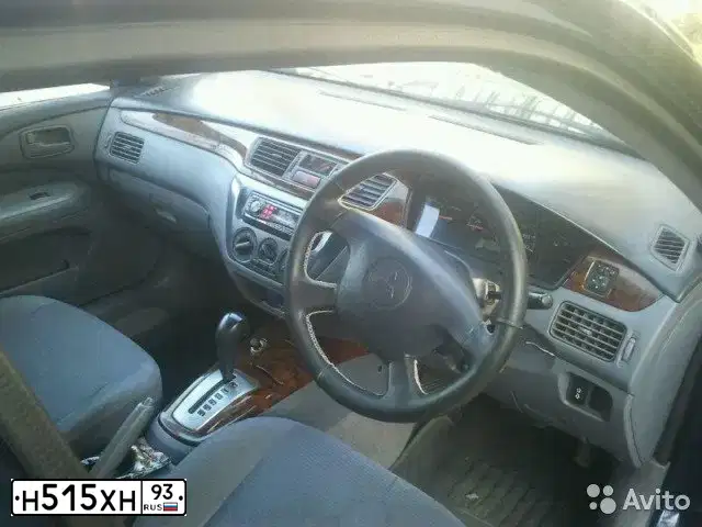 Фото автомобиля MITSUBISHI LANCER, 2002 — госномер Р987АА193. Цвет: синий