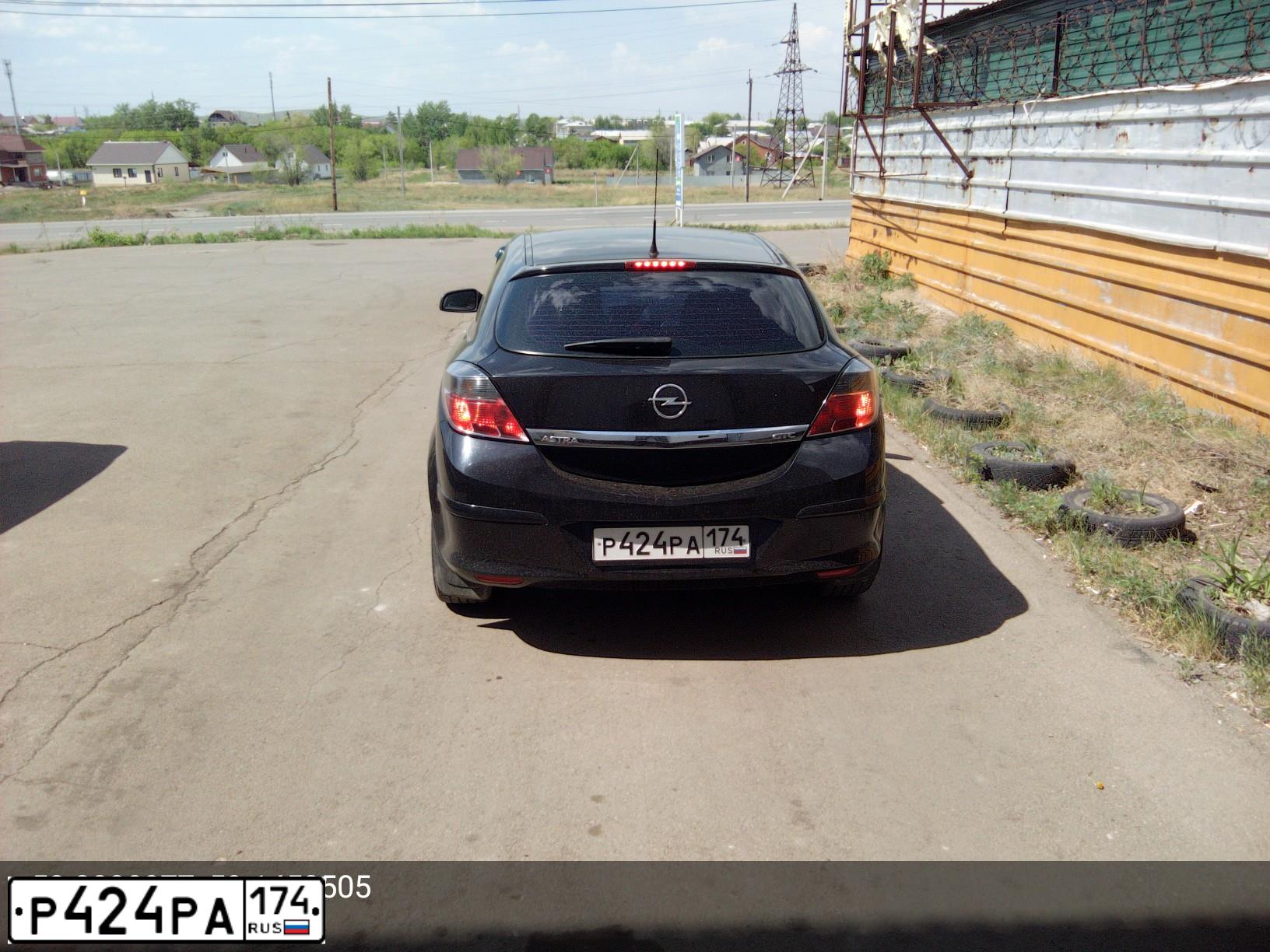 Фото автомобиля OPEL ASTRA, 2008 — госномер Е091УС702. Цвет: ЧЕРНЫЙ