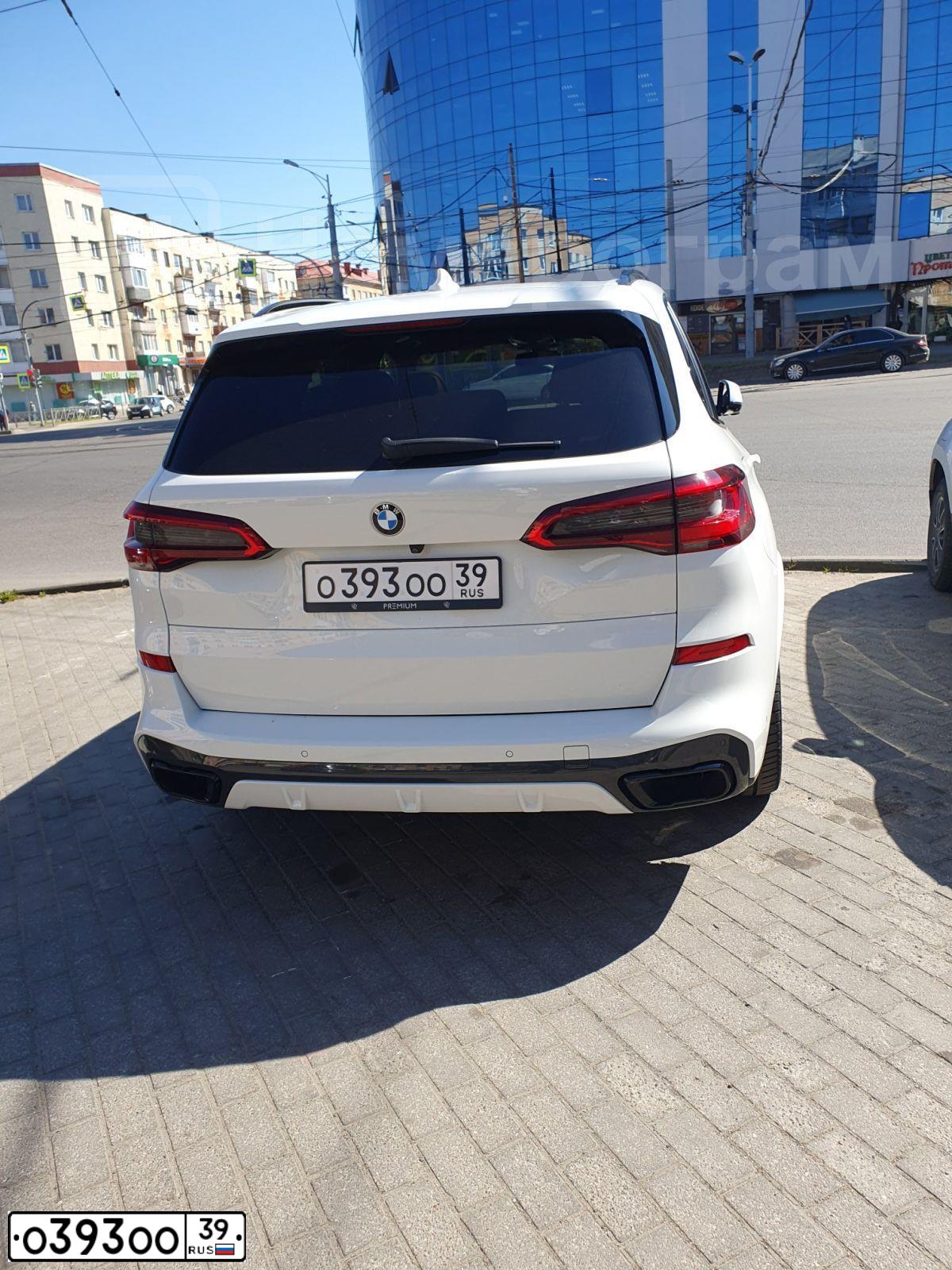 Фото автомобиля MAN TGA 41.XXX /8X4/, 2008 — госномер О393ОО39. Цвет: Белый