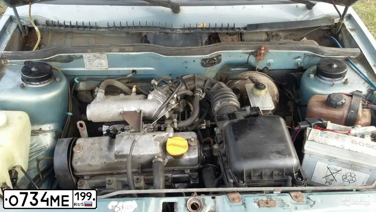 Фото автомобиля LADA 2114 SAMARA, 2004 — госномер О734МЕ199. Цвет: ЗОЛОТИСТО-СЕРЫЙ
