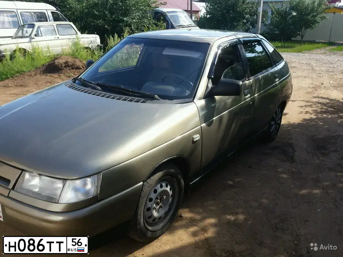 Фото автомобиля LADA 2112 LADA, 2001 — госномер Н086ТТ56. Цвет: СЕРЕБРИСТО-СЕРО-ЗЕЛЕНЫЙ