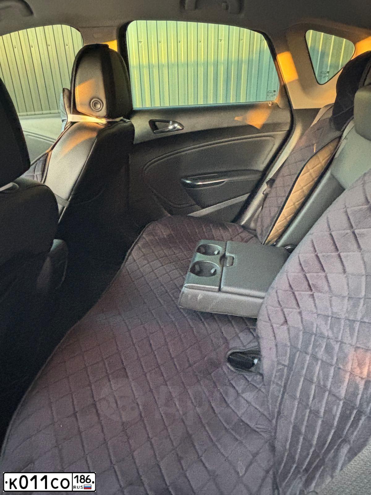 Фото автомобиля OPEL ASTRA, 2010 — госномер К011СО186. Цвет: Белый
