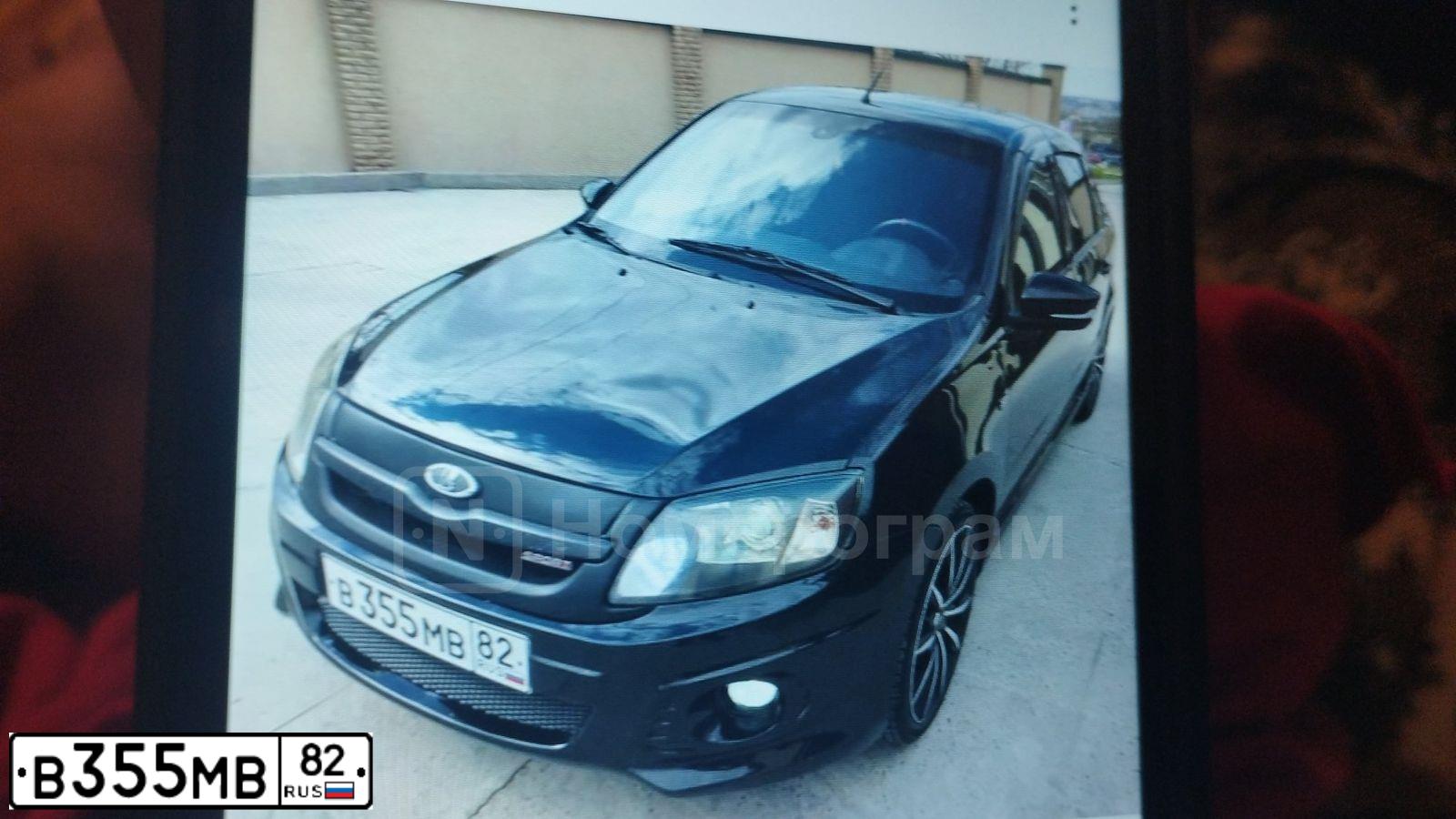 Фото автомобиля LADA 2190 GRANTA, 2014 — госномер К077АМ82. Цвет: ЧЕРНЫЙ