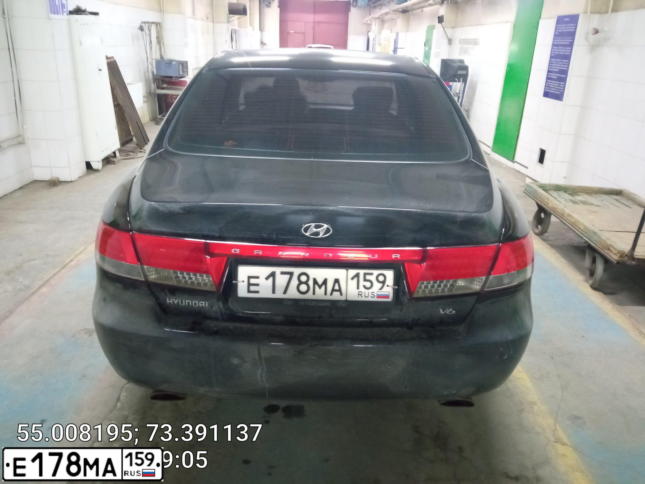 Фото автомобиля HYUNDAI GRANDEUR, 2008 — госномер Х695ЕХ55. Цвет: ЧЕРНЫЙ