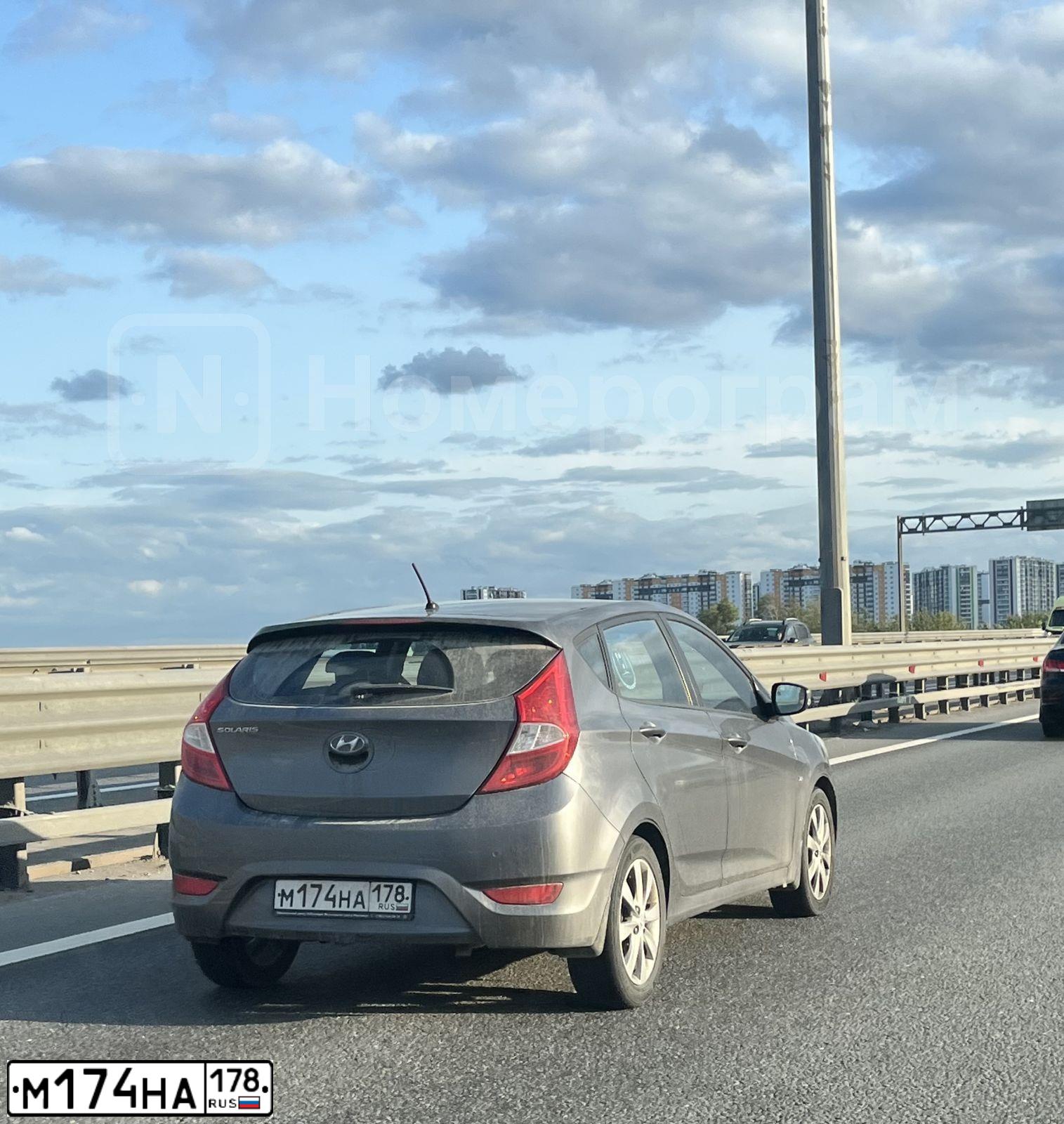 Фото автомобиля HYUNDAI SOLARIS, 2012 — госномер М174НА178. Цвет: ЧЕРНО-СЕРЫЙ
