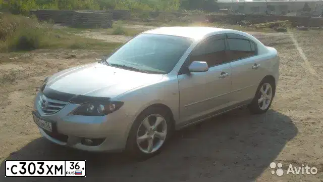 Фото автомобиля MAZDA 3, 2005 — госномер С303ХМ36. Цвет: СЕРЕБРИСТЫЙ