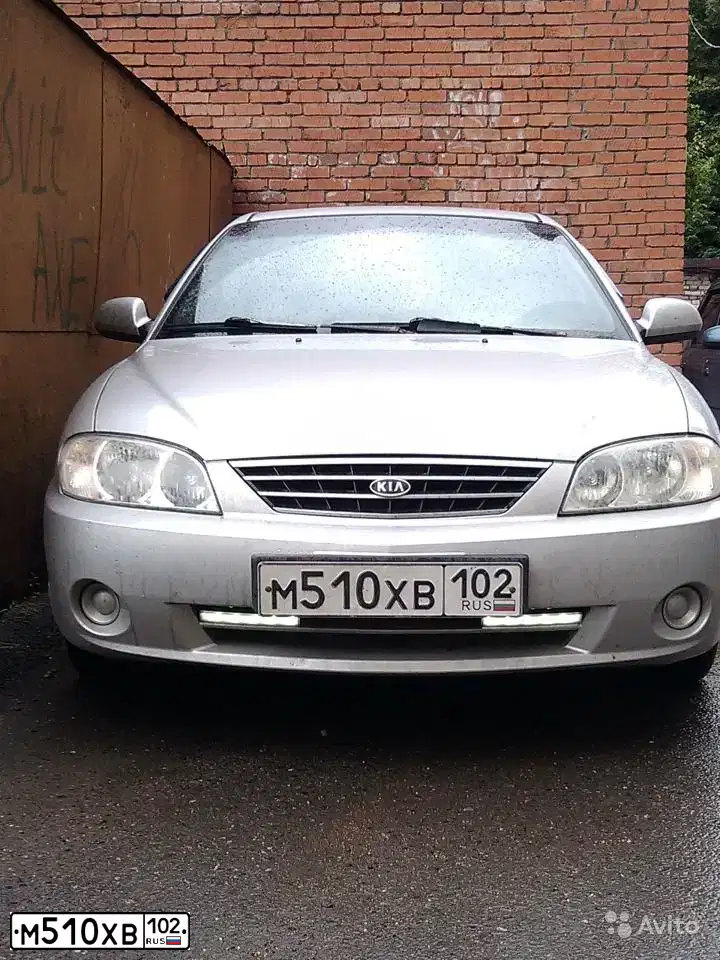 Фото автомобиля KIA SPECTRA, 2006 — госномер К926ВР702. Цвет: алмазное серебро (белый)