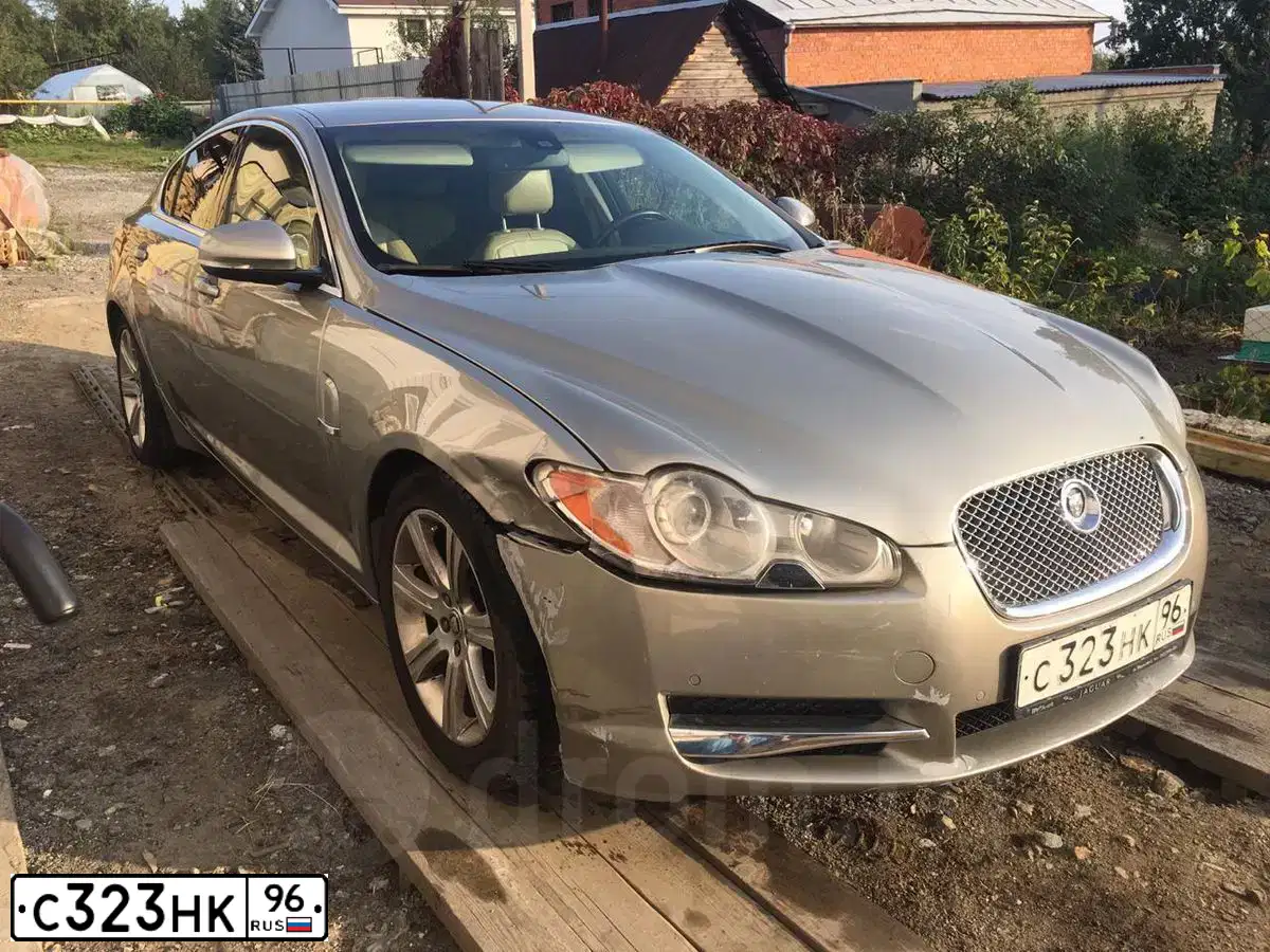 Фото автомобиля JAGUAR XF-SERIE, 2010 — госномер М749МУ159. Цвет: ЗОЛОТИСТЫЙ