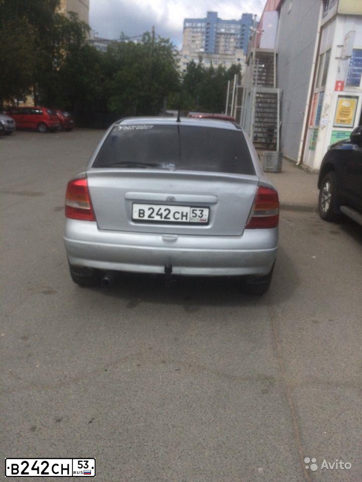 Фото автомобиля OPEL ASTRA, 2000 — госномер О749ХЕ198. Цвет: Серебристый