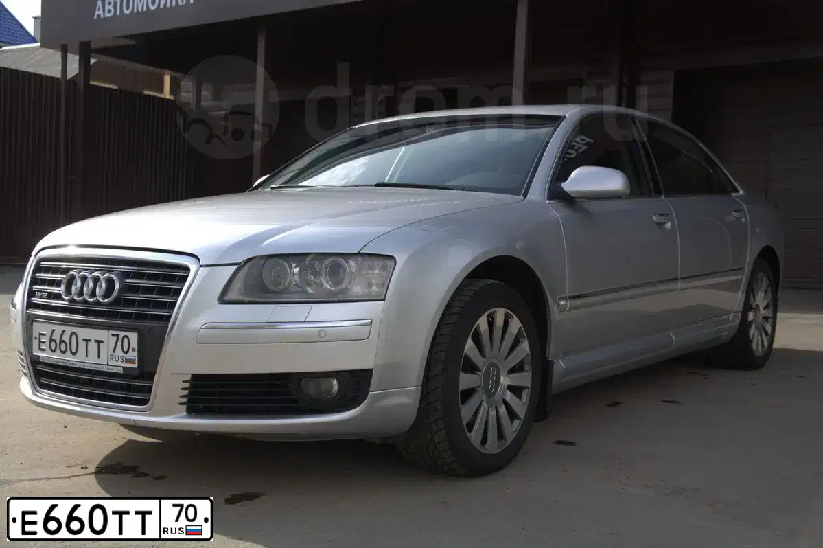 Фото автомобиля AUDI A8, 2004 — госномер Е660ТТ70. Цвет: СЕРЕБРИСТЫЙ