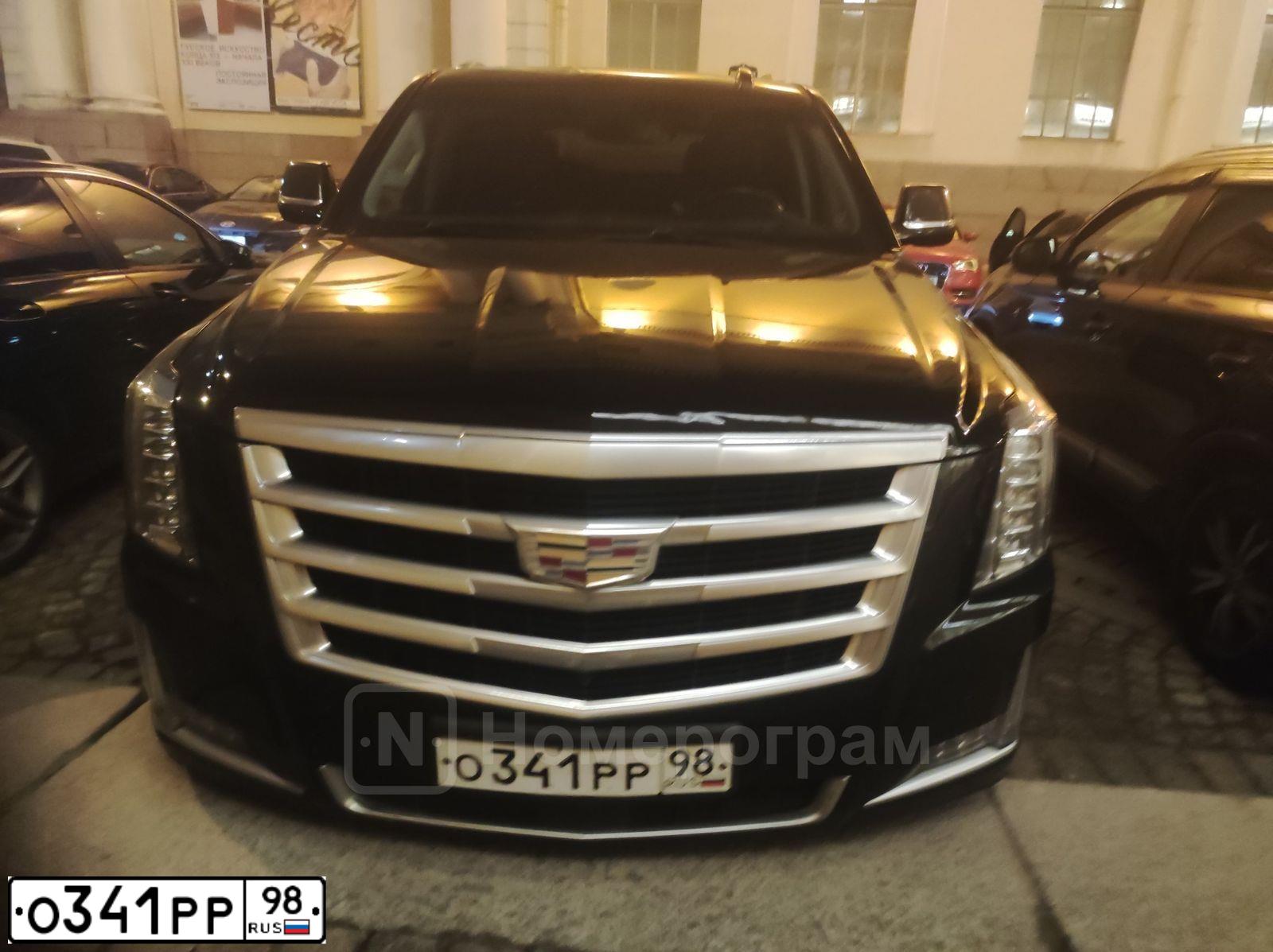 Фото автомобиля CADILLAC ESCALADE, 2016 — госномер О341РР98. Цвет: ЧЕРНЫЙ