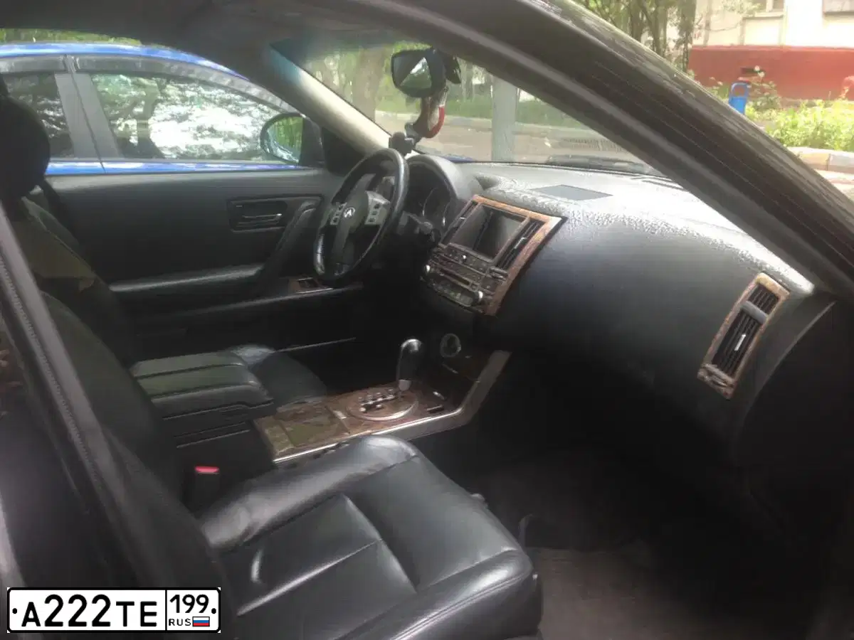Фото автомобиля INFINITI QX70 /FX/, 2005 — госномер М145КВ799. Цвет: ЧЕРНЫЙ