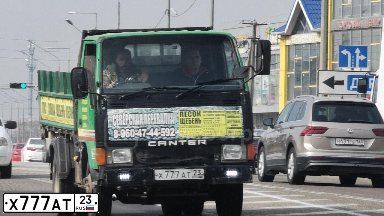 Фото автомобиля HYUNDAI /S-/COUPE / TUSCANI, 2005 — госномер Н200НР159. Цвет: ЧЕРНЫЙ