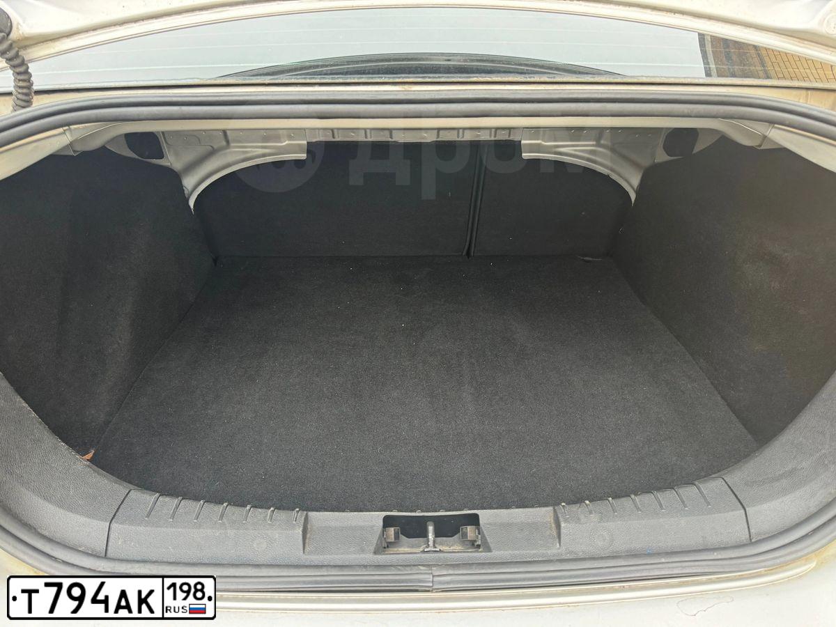 Фото автомобиля FORD FOCUS, 2009 — госномер Т794АК198. Цвет: Серебристый