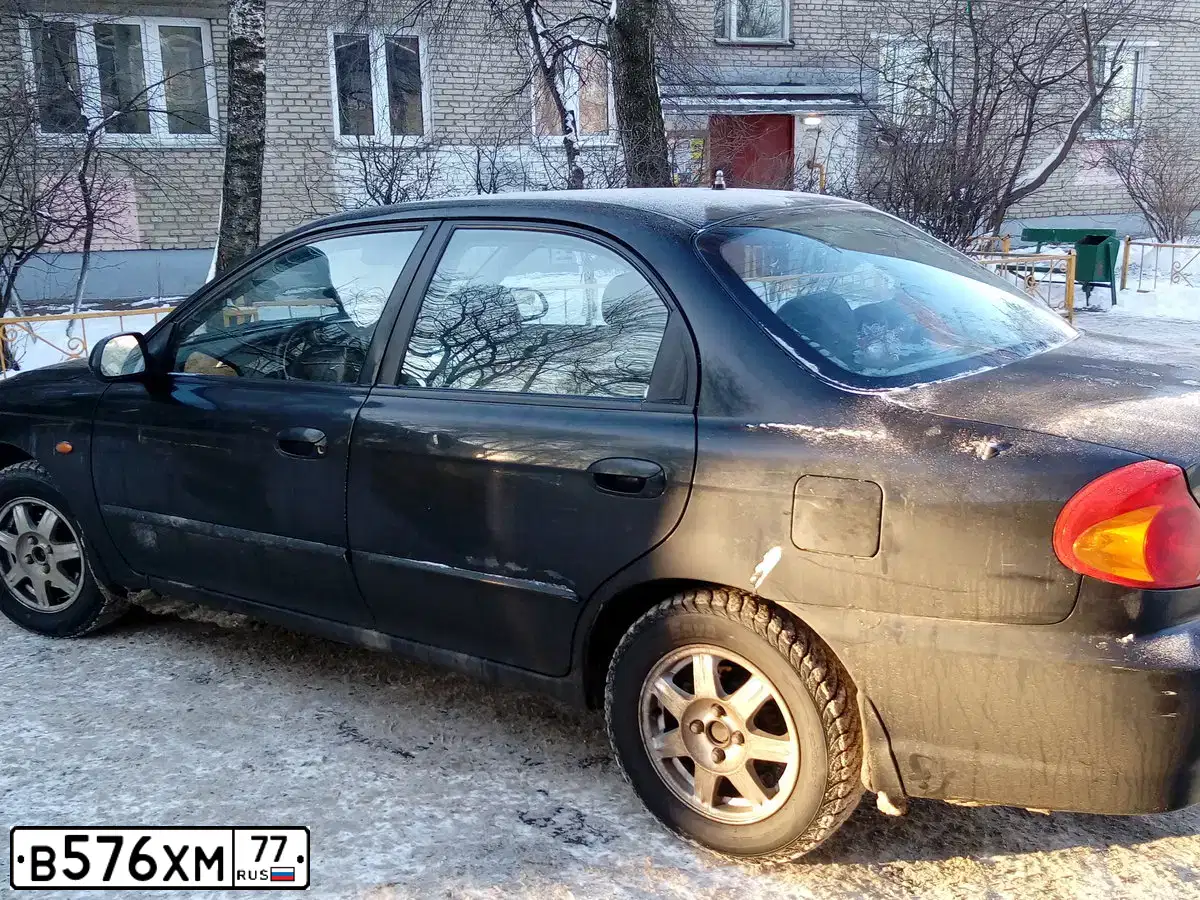 Фото автомобиля KIA SPECTRA, 2006 — госномер Р995ТМ69. Цвет: ЧЕРНЫЙ