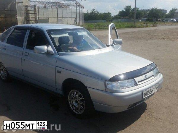Фото автомобиля LADA 2112, 2004 — госномер О128НР32. Цвет: Серебристо-Желтый