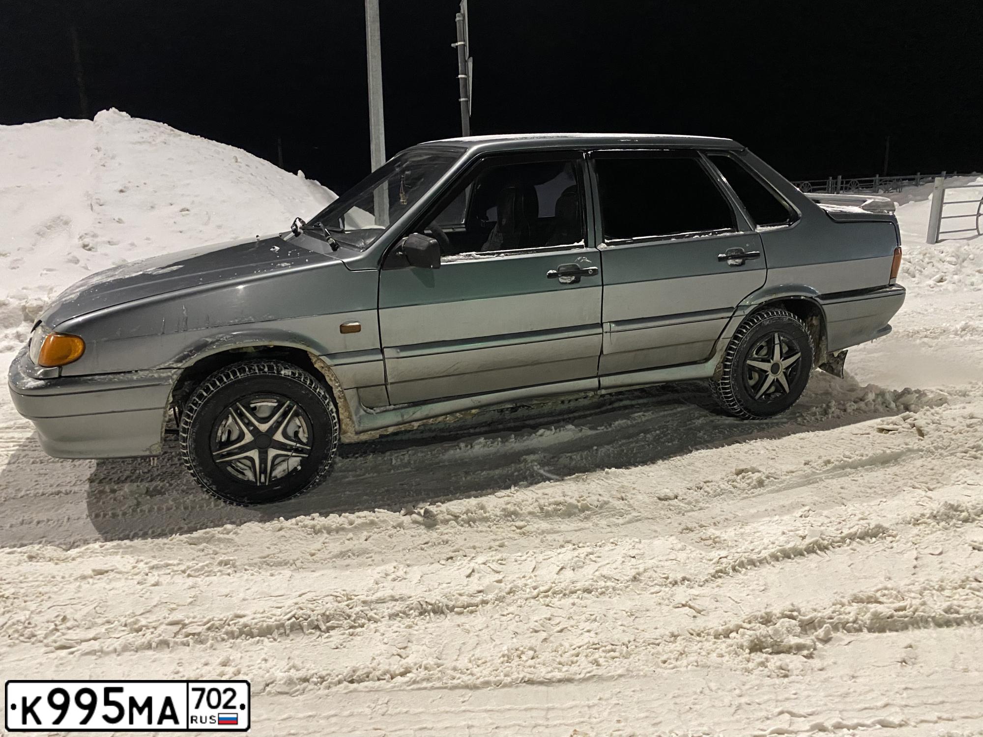 Фото автомобиля LADA 2115 SAMARA, 2008 — госномер К995МА702. Цвет: средний серо-зеленый металлик