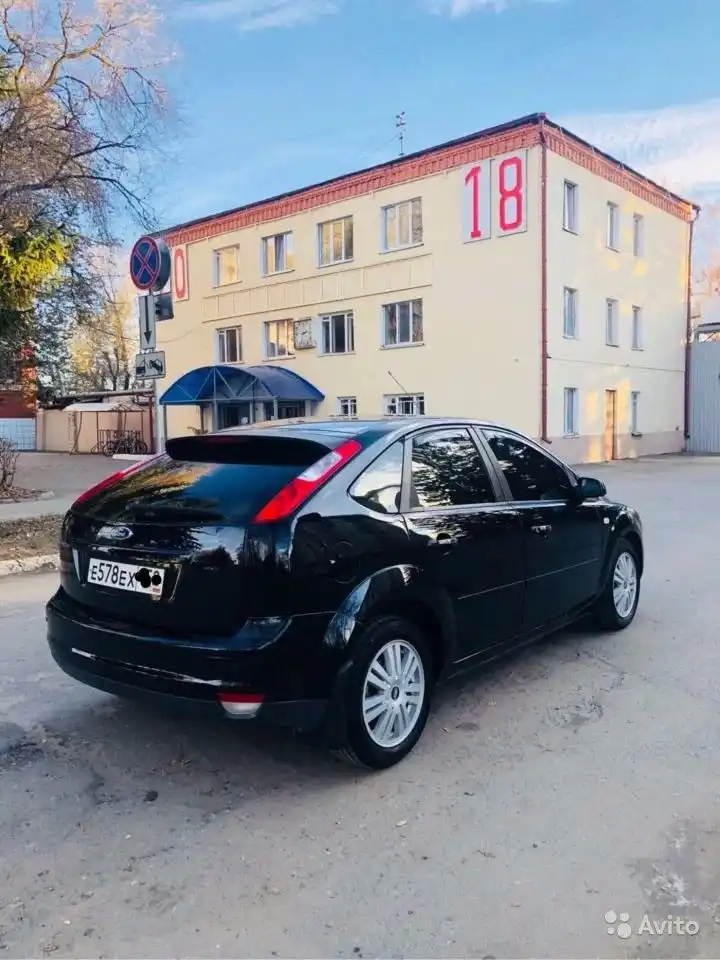 Фото автомобиля FORD FOCUS, 2007 — госномер М158СС40. Цвет: ЧЕРНЫЙ