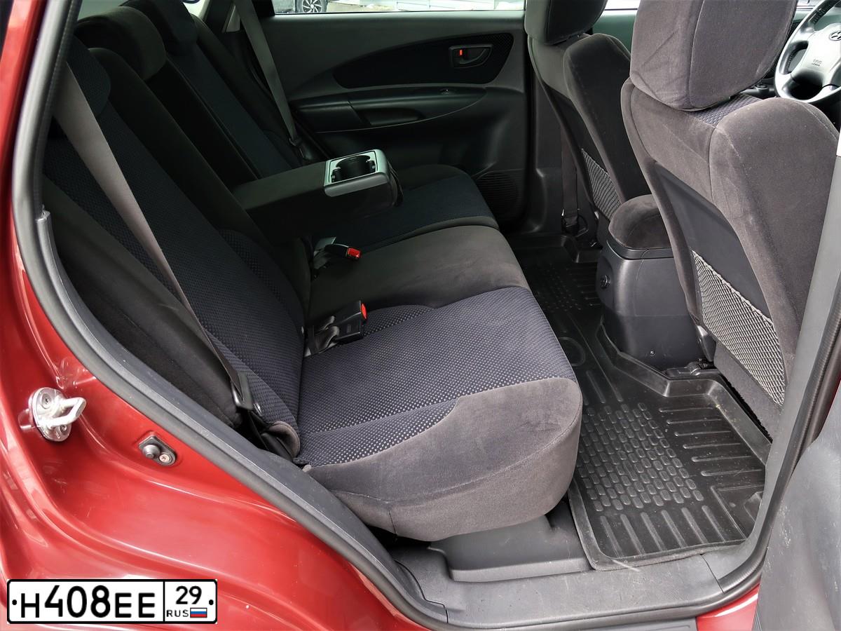 Фото автомобиля HYUNDAI TUCSON, 2008 — госномер Р253СР29. Цвет: ТЕМНО-КРАСНЫЙ
