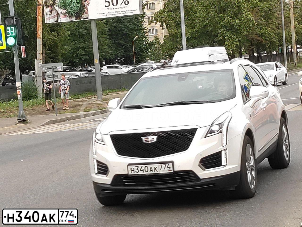 Фото автомобиля CADILLAC XT5, 2020 — госномер Н340АК774. Цвет: Белый