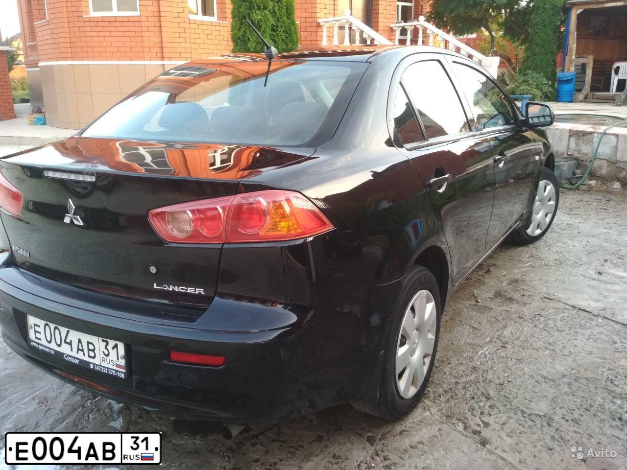 Фото автомобиля MITSUBISHI LANCER, 2007 — госномер Т832ВО31. Цвет: ЧЕРНЫЙ