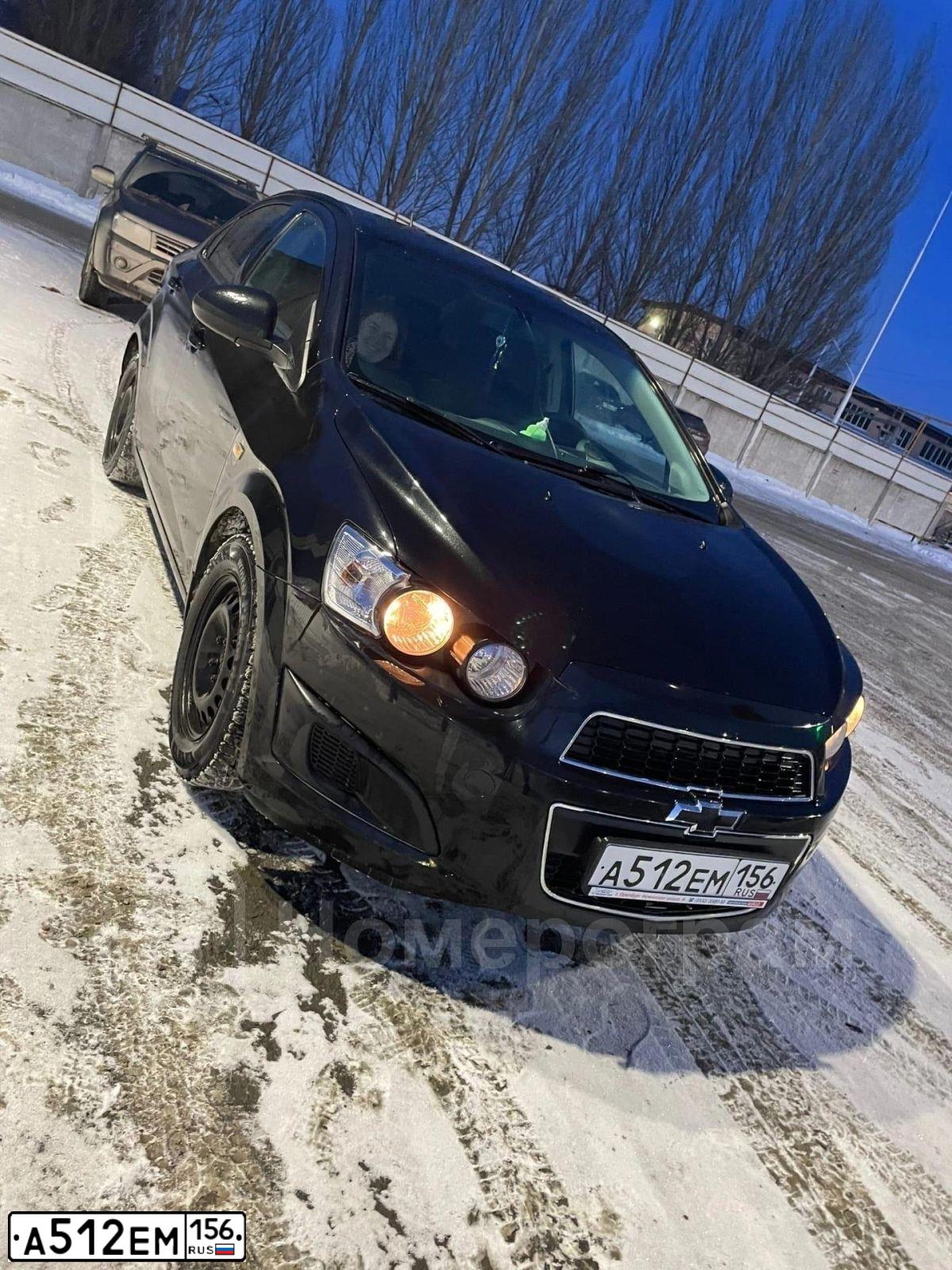 Фото автомобиля CHEVROLET AVEO, 2013 — госномер А512ЕМ156. Цвет: ЧЕРНЫЙ МЕТАЛЛИК