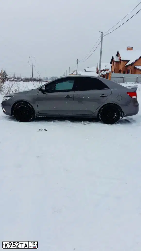 Фото автомобиля KIA CERATO, 2010 — госномер С585ВО152. Цвет: Серый