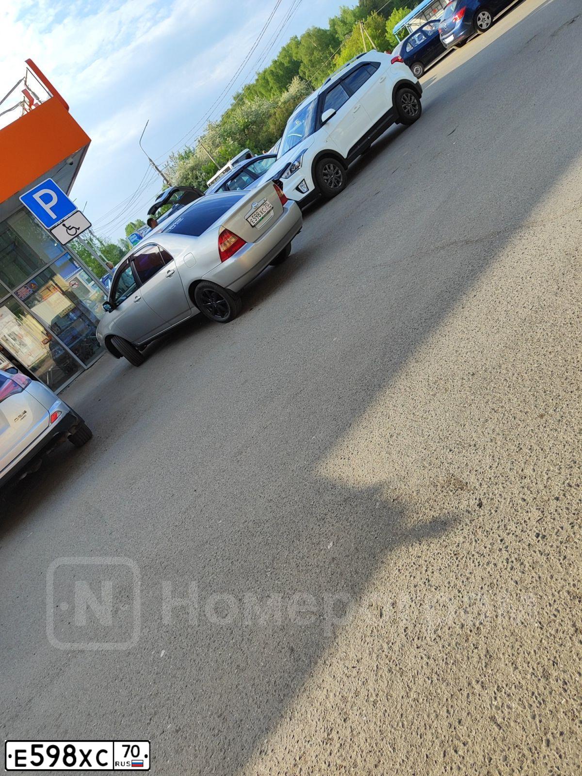 Фото автомобиля TOYOTA COROLLA, 2002 — госномер Н820УМ70