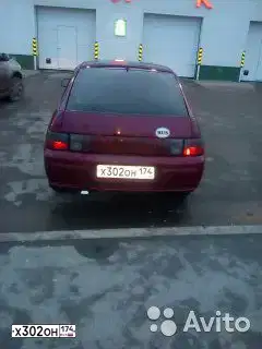Фото автомобиля LADA 2112, 2004 — госномер Х302ОН174. Цвет: ТЕМНО-КРАСНЫЙ