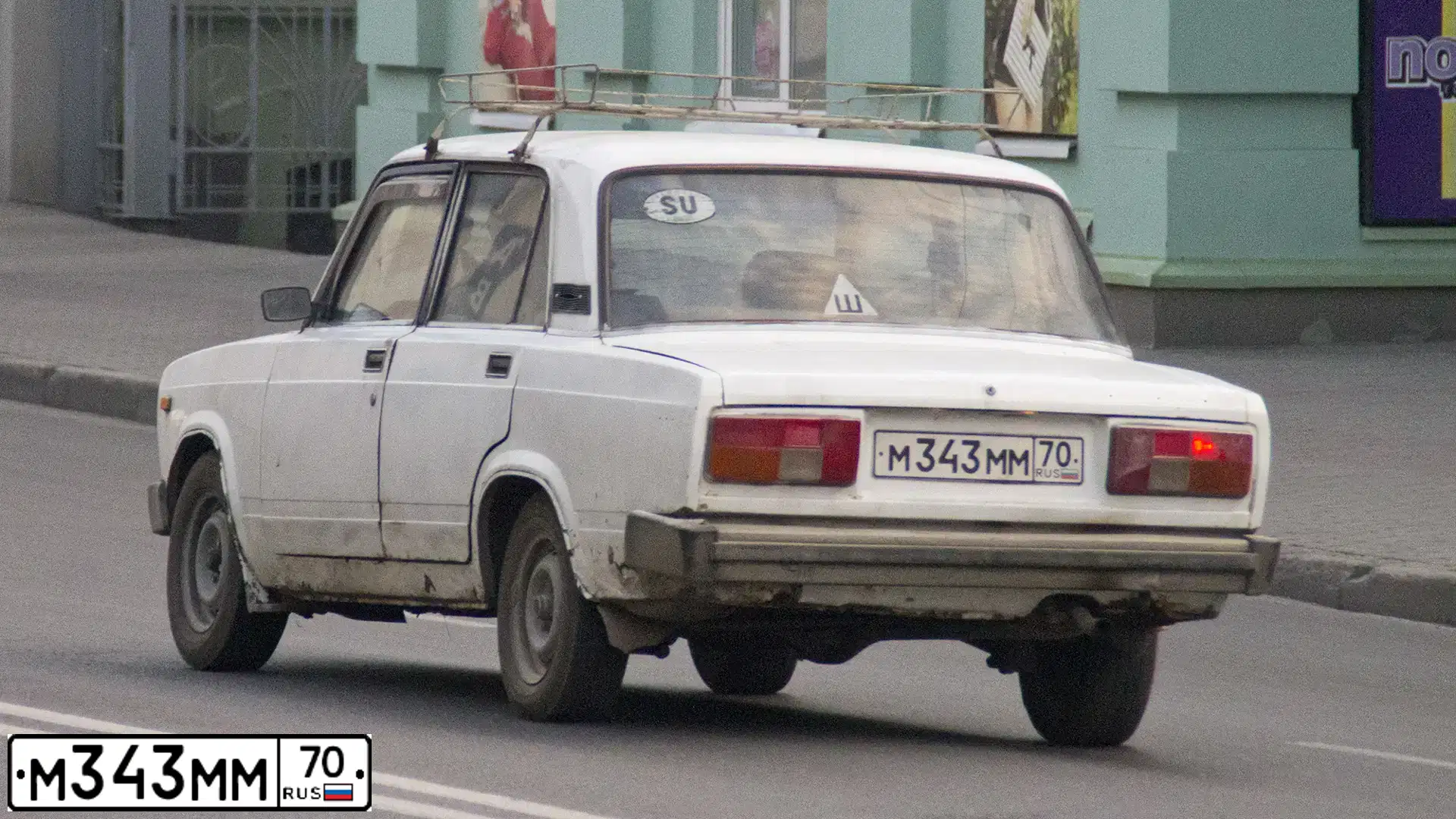 Фото автомобиля LADA 2105, 1988 — госномер М343ММ70. Цвет: Белый