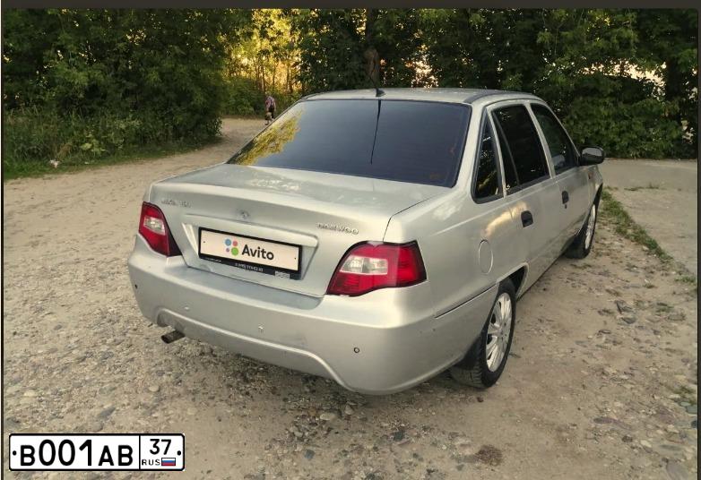 Фото автомобиля DAEWOO NEXIA, 2010 — госномер В001АВ37. Цвет: Серебристый