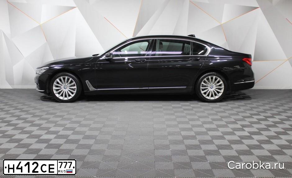 Фото автомобиля BMW SERIE 7, 2016 — госномер Н412СЕ777. Цвет: ЧЕРНЫЙ