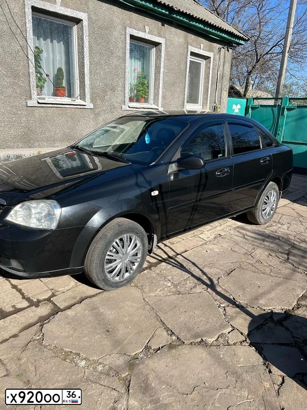 Фото автомобиля CHEVROLET LACETTI, 2006 — госномер Х920ОО36. Цвет: ЧЕРНЫЙ