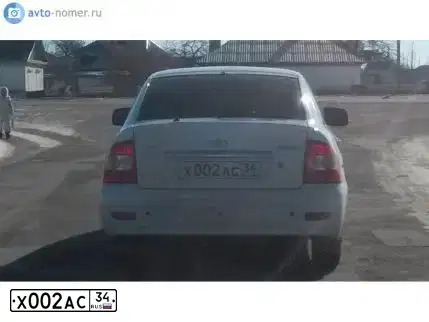 Фото автомобиля LADA GFL 110 LADA VESTA, 2017 — госномер Н203КА134. Цвет: ЧЕРНЫЙ