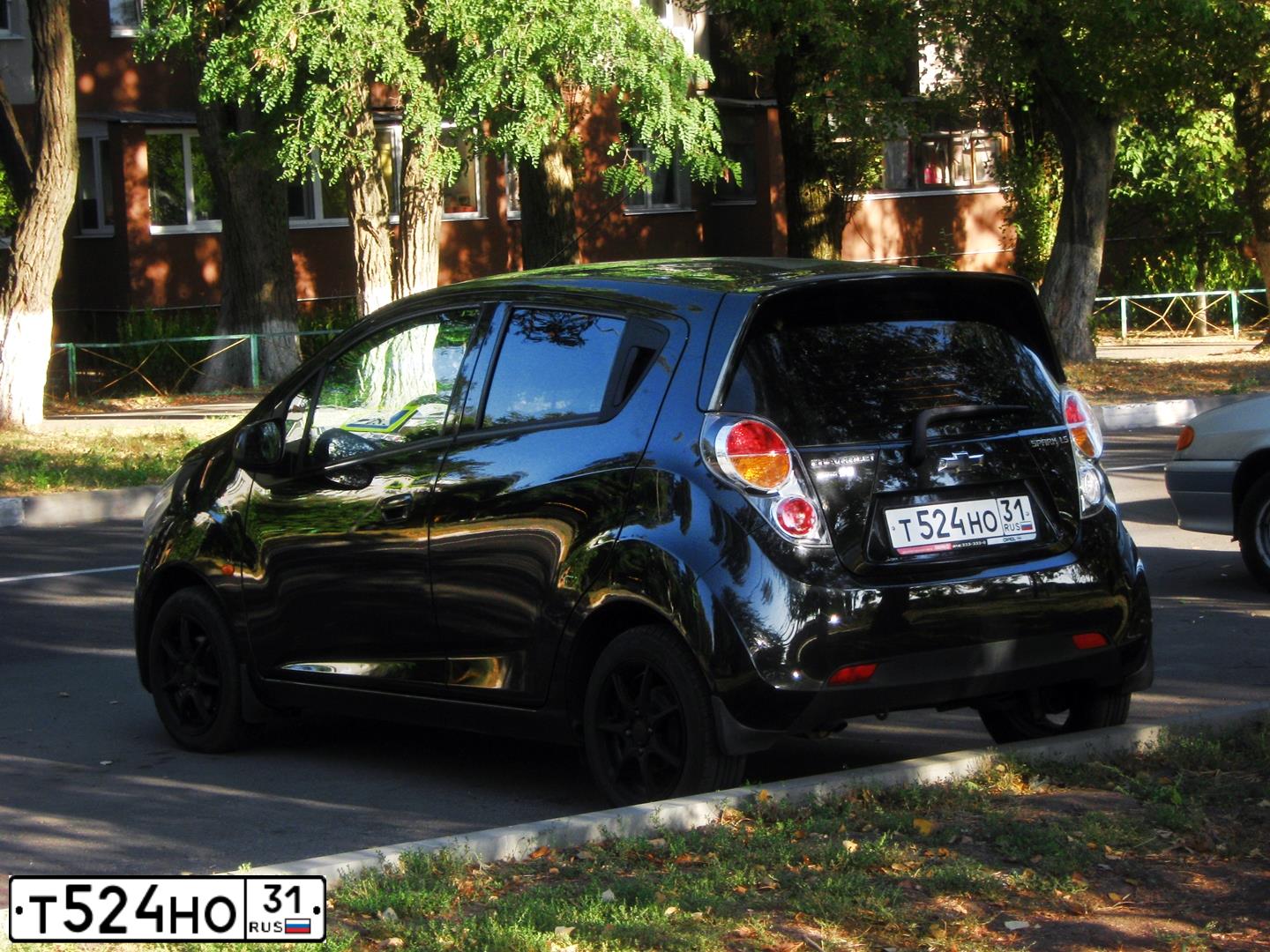 Фото автомобиля CHEVROLET SPARK, 2012 — госномер Н426АВ178. Цвет: ЧЕРНЫЙ