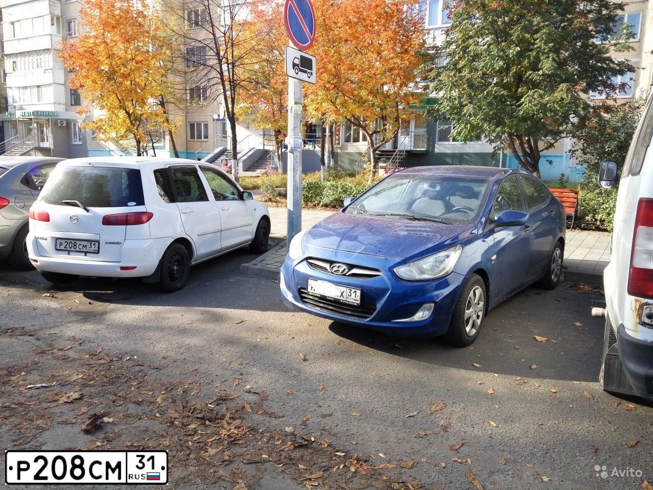 Фото автомобиля МАЗДА DЕМIО МАЗДА DЕМIО, 2003 — госномер Р208СМ31. Цвет: Белый