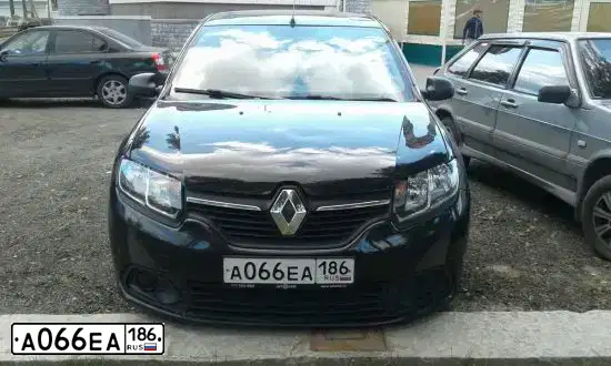 Фото автомобиля RENAULT LOGAN, 2016 — госномер А066ЕА186. Цвет: ЧЕРНЫЙ